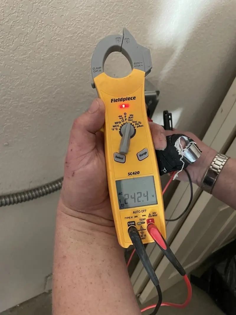 Voltage testing with clamp meter during Aluminum Wiring Replacement in Millbury